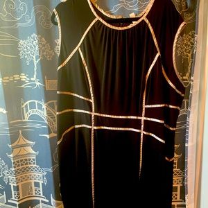 Black dress with satin piping